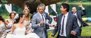 Illustration for article titled Jeff Goldblum Poses for Couple's Dinosaur Chase-Themed Wedding Photo
